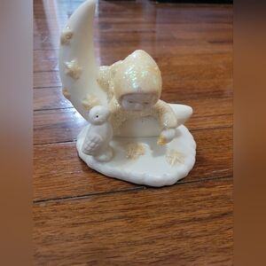 Snowbaby Figurine - Baby Laying on Crescent Moon with Bird at his Side
